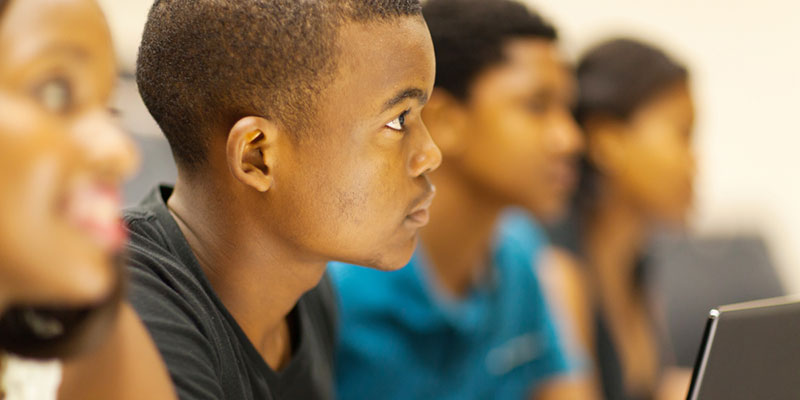 Students listening to a presentation