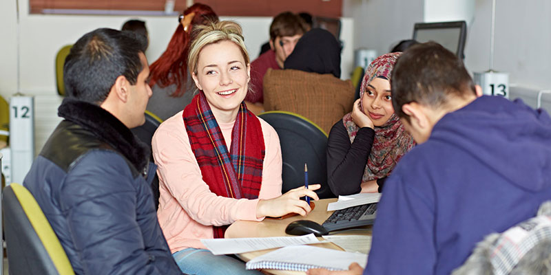 Four students working together