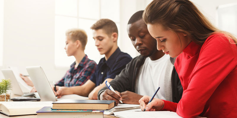 Four university students studying