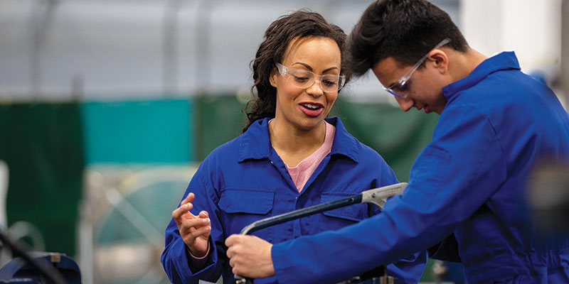 Two students in the workplace