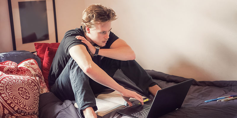 Student alone in bedroom