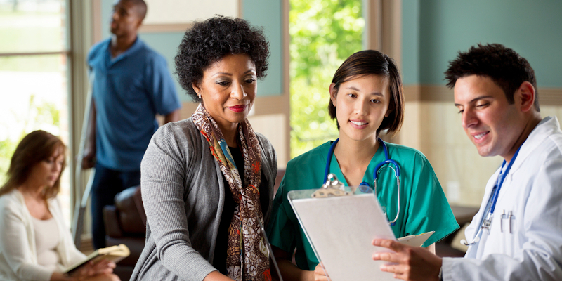 Medical staff looking at notes