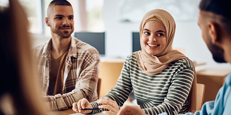 Three students talking