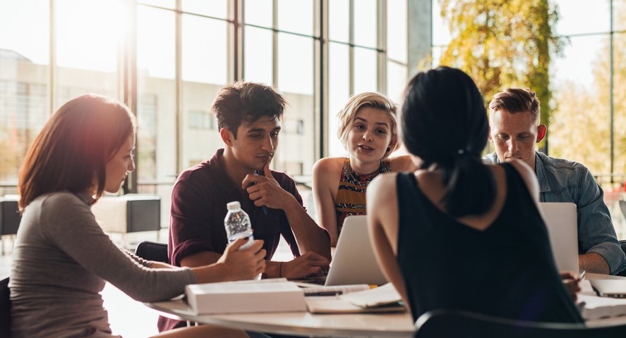 University students around a table