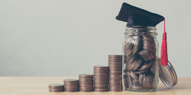 Coins and graduation cap