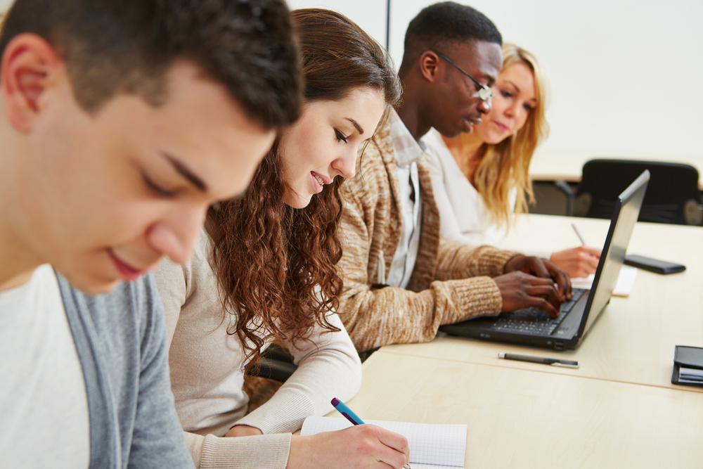 Photograph of students learning together.