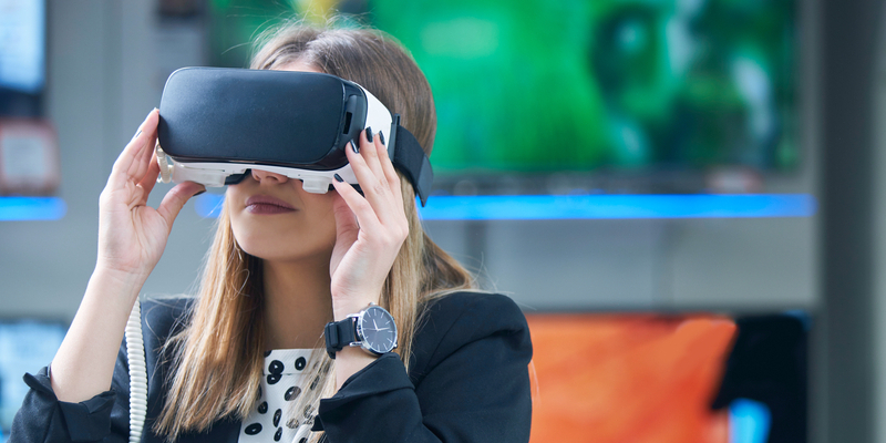Young woman with virtual reality headset
